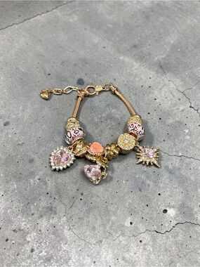 Gold Pink Charm Bracelet with Heart and Sun Pendants